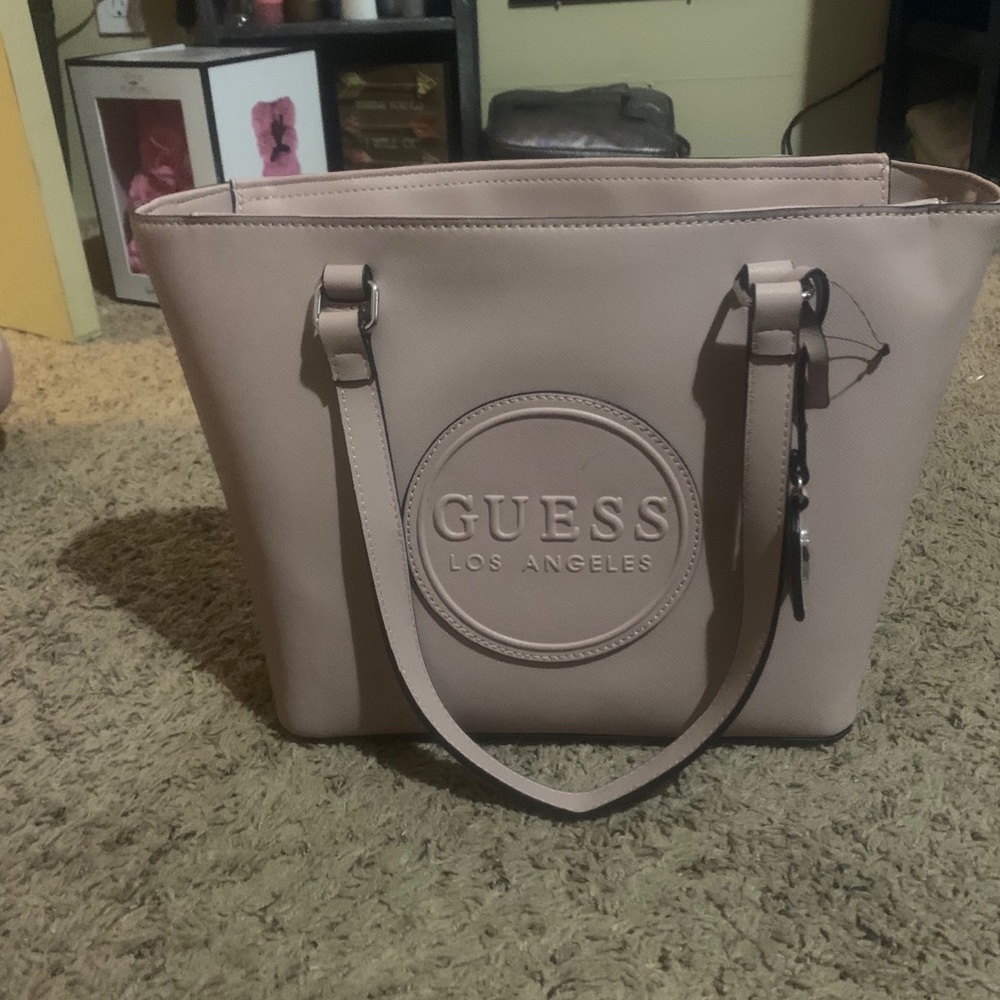Guess Purse never used and still has tags